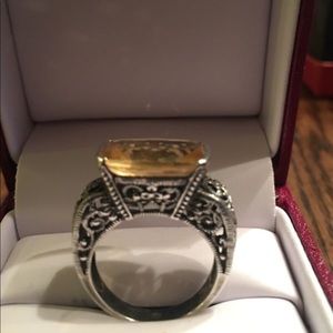 Stamped sterling silver ring. Citrine stone.